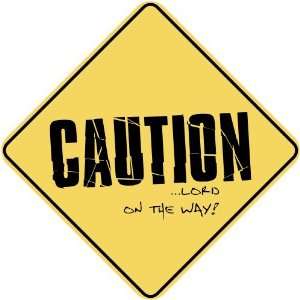   CAUTION  LORD ON THE WAY  CROSSING SIGN