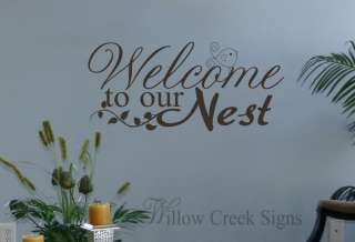 welcome to our nest shown in chocolate vinyl 27 wide