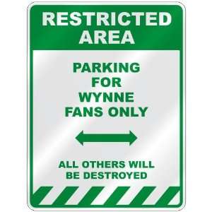   PARKING FOR WYNNE FANS ONLY  PARKING SIGN