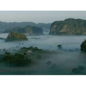 Fog Surrounds Mogotes in the Valle De Vinales at Sunrise Photographic 