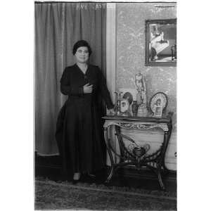  Amy Castles,standing next to table with photos,Australian 