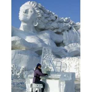 Harbin City, A Tourist Is Playing a Sculpted Ice Piano, Snow and Ice 