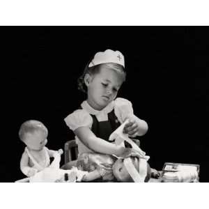  Girl Wearing Nurses Cap, Putting Bandages on Dolls Head 