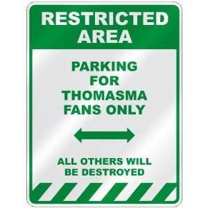   PARKING FOR THOMASMA FANS ONLY  PARKING SIGN