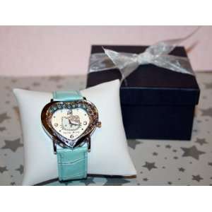 Shaped Watch in Light Blue. Comes in Dark Blue Giftbox with the watch 