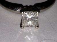 Ladys Platinum diamond engagement ring w/ .71 carat GIA princess cut 