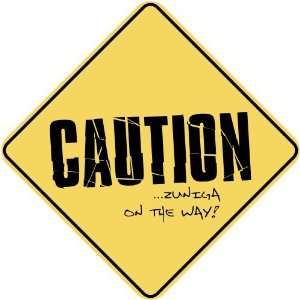   CAUTION  ZUNIGA ON THE WAY  CROSSING SIGN