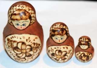 5pc RUSSIAN WOOD BURNED NESTING DOLL SET W/GOLD & WHITE PAINT NR 