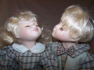 This is a cute pair of porcelain Dolls.