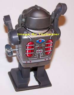 CAPTAIN THE ROBOT MECHANICAL WIND UP SPARKING TOY  