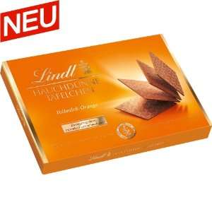 Lindt Hauchdünne Täfelchen Sommer, Vollmilch Orange (100g  2.88€)
