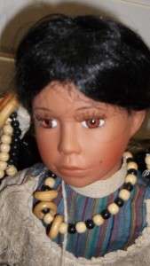 ASHLEY BELLE NATIVE AMERICAN PORCELAIN DOLL WITH STAND  