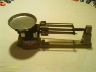 YOUR BIDDING ON A OHAVS 2610 GRAMS SERIES TRIPLE BEAM BALANCE SCALE 