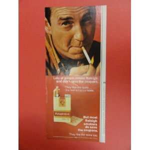  Raleigh cigarettes, 60s Print Ad (man lighting cigarette 