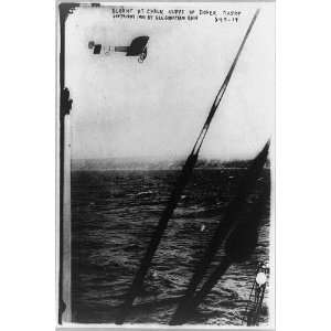  Louis Bleriot in plane over the cliff of Dover,1909