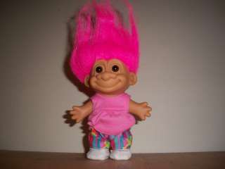 NEXT, THERES A REALY GROOVY LITTLE GIRL TROLL, WITH HER TYE DYE PANTS 