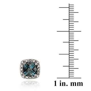   London Blue Topaz gemstones. One diamond is set in each earring
