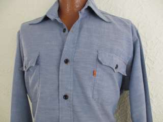   , with orange stitching and orange tag. The fabric is a cotton blend
