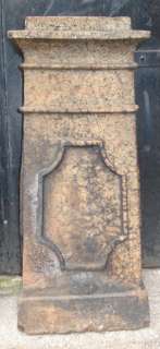 pair of old large buff square panelled chimney pots