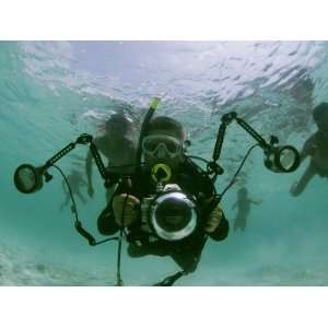  Photographer with Camera Underwater with Diving Moken 